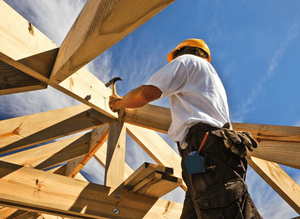 A busy builder working on the construction of a new build home.